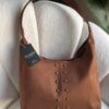 77a18fbe-2467-4896-9c42-7bb5b4689315 Ruby Suede Camel Bag