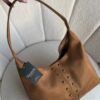 094fc3dd-27ea-4d0e-bfd2-34702b135c27 Ruby Light Camel Bag